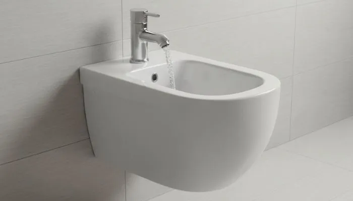 white-wall-hung-bidet-with-chrome-faucet-running-water-bidet-fixture-repair-plumbing-experts
